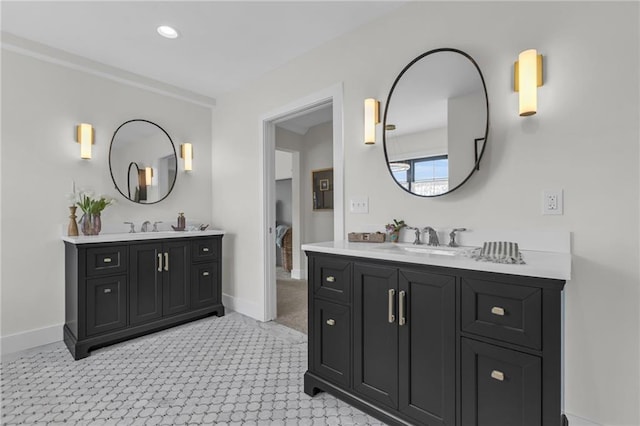 12811 W 71st St, Shawnee, KS 66216 - ensuite bathroom featuring two vanities and recessed lighting