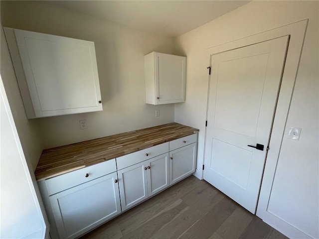 12811 W 71st St, Shawnee, KS 66216 - kitchen featuring wood counters, dark wood finished floors, and white cabinets