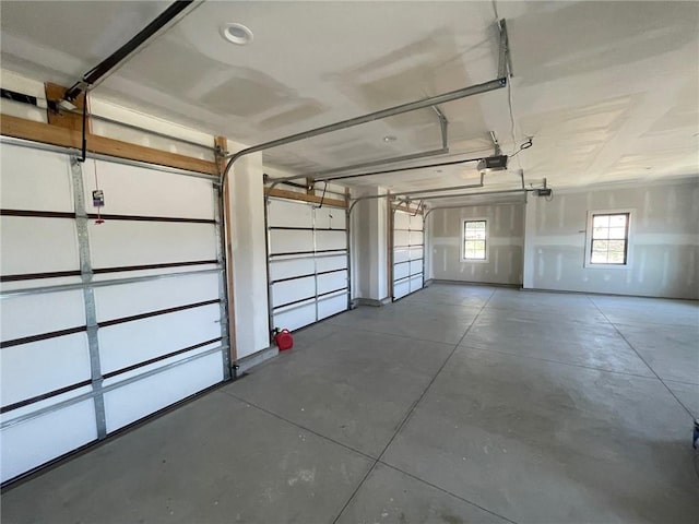 12811 W 71st St, Shawnee, KS 66216 - garage featuring a garage door opener