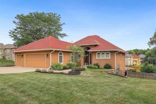 5214 NE 70th St, Kansas City, MO 64199 - mediterranean / spanish house featuring a garage, driveway, and stucco siding