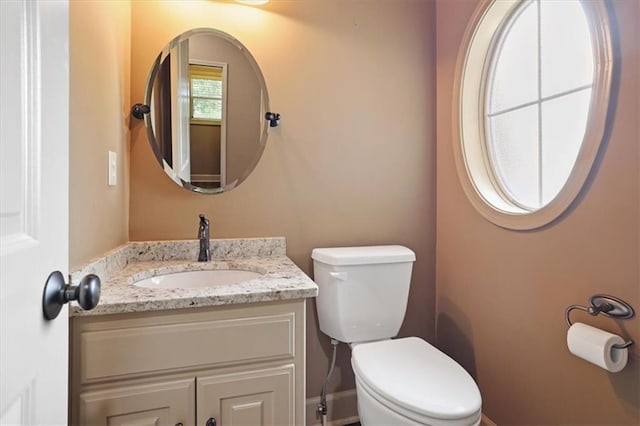 5214 NE 70th St, Kansas City, MO 64199 - bathroom with toilet and vanity