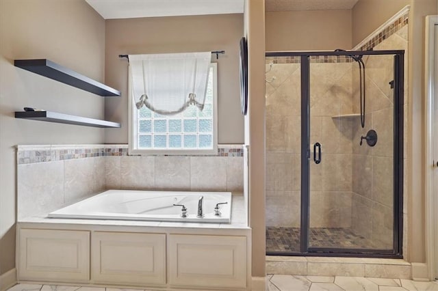 5214 NE 70th St, Kansas City, MO 64199 - bathroom with a garden tub, a shower stall, and tile patterned flooring