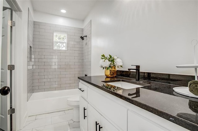 1975 Parallel Pkwy, Kansas City, KS 66104 - bathroom featuring vanity, shower / bath combination, marble finish floors, and recessed lighting