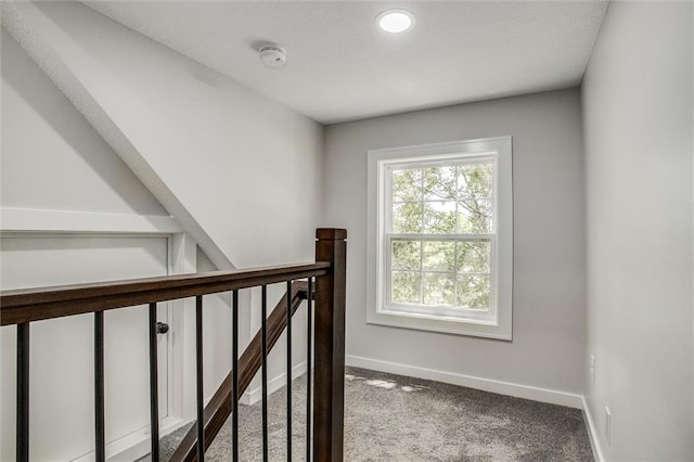 1975 Parallel Pkwy, Kansas City, KS 66104 - corridor featuring an upstairs landing and carpet flooring