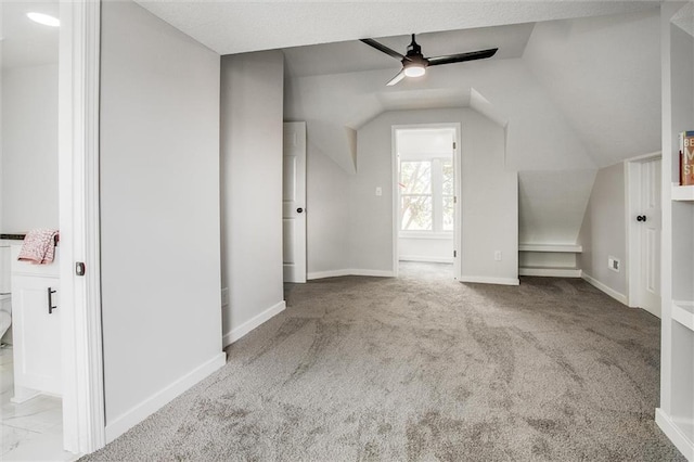 1975 Parallel Pkwy, Kansas City, KS 66104 - bonus room with a ceiling fan, lofted ceiling, and carpet floors