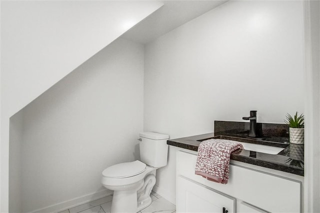 1975 Parallel Pkwy, Kansas City, KS 66104 - half bath featuring vanity and marble look tiles