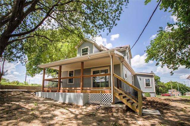 1975 Parallel Pkwy, Kansas City, KS 66104 - back of property with a porch