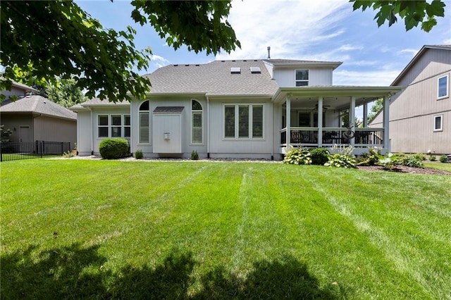 16369 S Woodstone Dr, Olathe, KS 66062 - back of property featuring a ceiling fan and roof with shingles