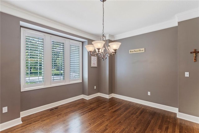 16369 S Woodstone Dr, Olathe, KS 66062 - spare room featuring a chandelier, ornamental molding, and dark wood-style floors