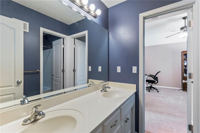 16369 S Woodstone Dr, Olathe, KS 66062 - full bath with double vanity and ceiling fan