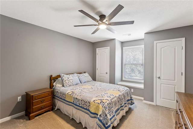 16369 S Woodstone Dr, Olathe, KS 66062 - bedroom with light colored carpet and ceiling fan