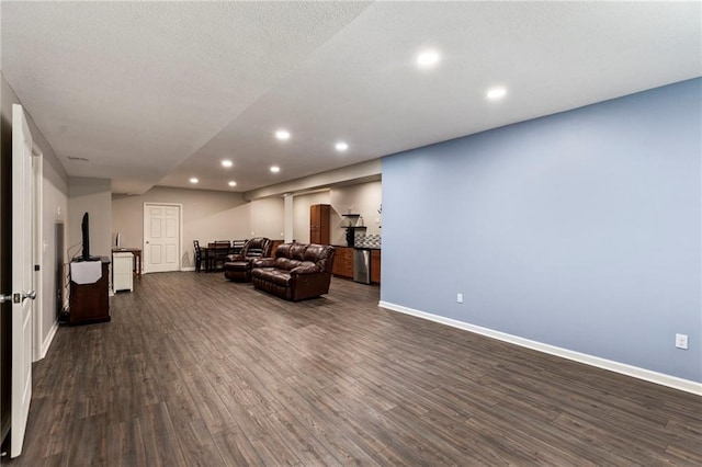 16369 S Woodstone Dr, Olathe, KS 66062 - living room with dark wood finished floors and recessed lighting