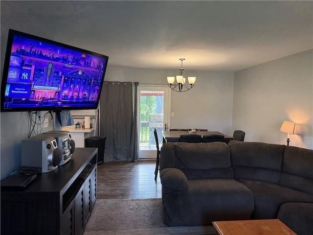 913 N Pine St, Cameron, MO 64429 - living area with a chandelier and wood finished floors