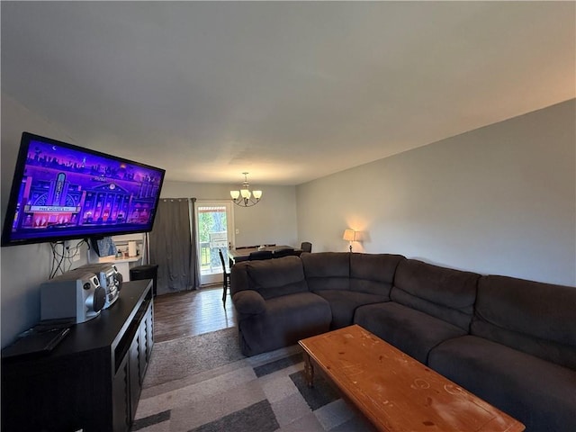 913 N Pine St, Cameron, MO 64429 - living room featuring a chandelier and wood finished floors