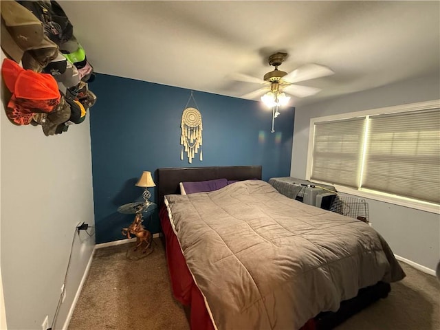913 N Pine St, Cameron, MO 64429 - carpeted bedroom featuring baseboards and ceiling fan