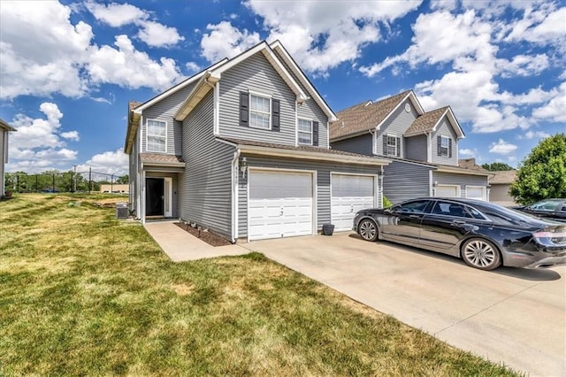 4540 NE 83rd Ter, Kansas City, MO 64119 - traditional home with driveway, a front yard, and an attached garage