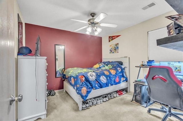 4540 NE 83rd Ter, Kansas City, MO 64119 - carpeted bedroom with a ceiling fan