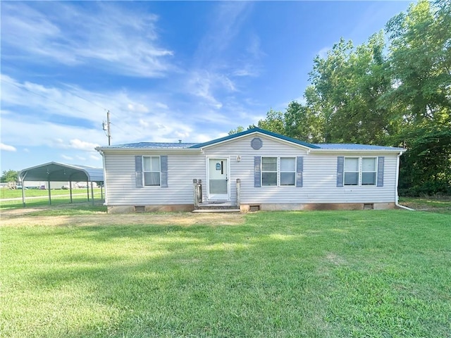 122 Fairway Dr, Mound City, KS 66056 - manufactured / mobile home with a carport, a front lawn, crawl space, and entry steps