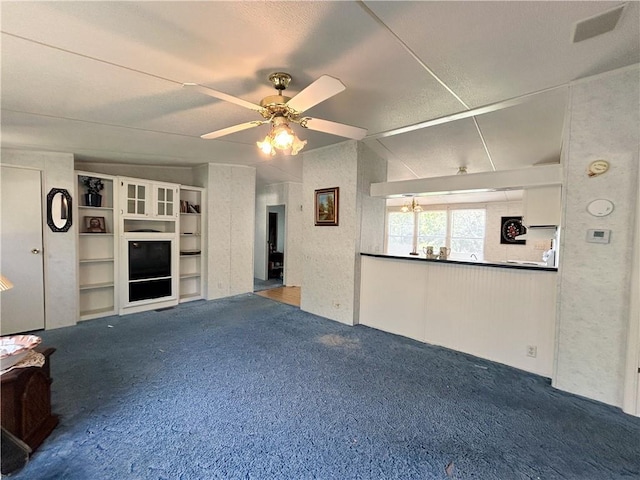122 Fairway Dr, Mound City, KS 66056 - unfurnished living room with carpet floors and ceiling fan