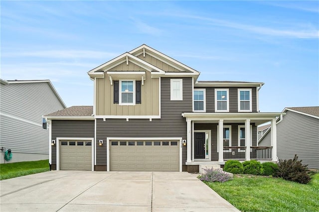 14446 Houston St, Olathe, KS 66061 - craftsman house featuring board and batten siding, driveway, covered porch, a front lawn, and an attached garage