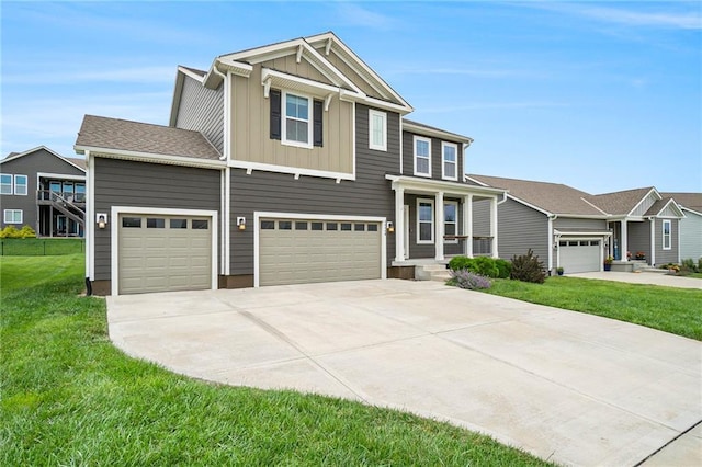 14446 Houston St, Olathe, KS 66061 - view of front of property featuring board and batten siding, driveway, a front yard, a garage, and an attached garage