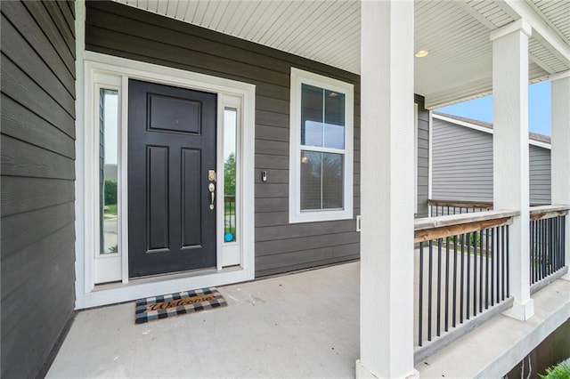 14446 Houston St, Olathe, KS 66061 - entrance to property featuring covered porch