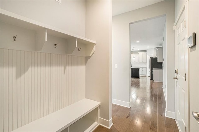 14446 Houston St, Olathe, KS 66061 - mudroom featuring dark wood finished floors and recessed lighting
