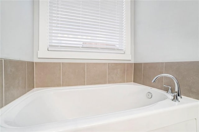 14446 Houston St, Olathe, KS 66061 - bathroom with a bath