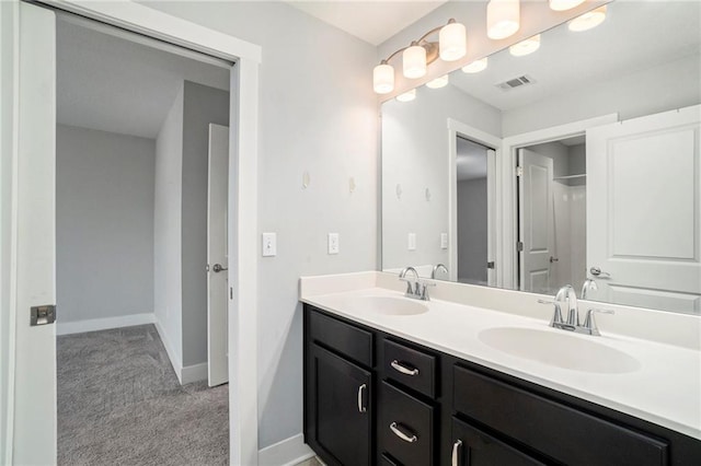 14446 Houston St, Olathe, KS 66061 - full bath with double vanity and baseboards