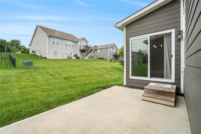 14446 Houston St, Olathe, KS 66061 - view of green lawn featuring a patio and a residential view