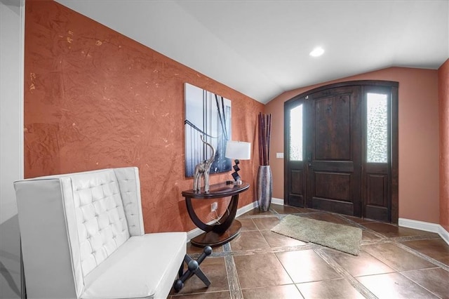 7103 E 159th St, Belton, MO 64012 - entryway featuring vaulted ceiling, inlaid floor details, and recessed lighting