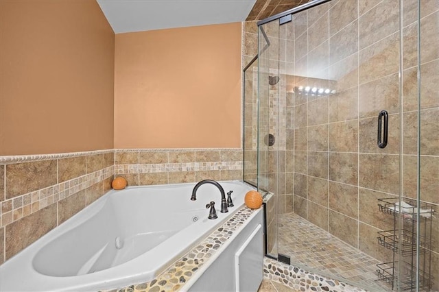 7103 E 159th St, Belton, MO 64012 - full bathroom with a jetted tub and a shower stall