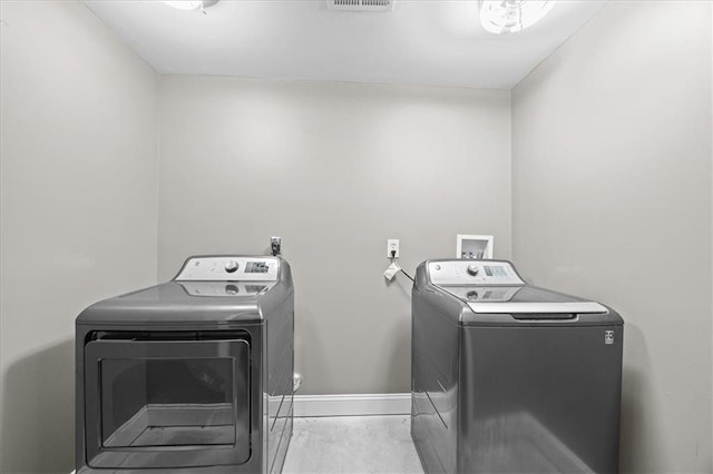 7103 E 159th St, Belton, MO 64012 - laundry area with washer and dryer