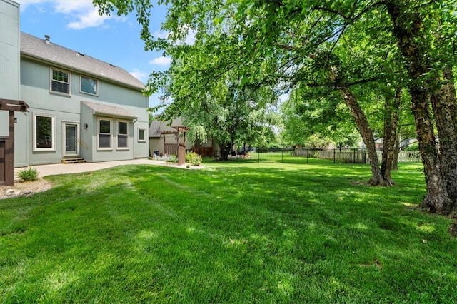 14155 W 147th Ter, Olathe, KS 66062 - view of yard featuring a patio and entry steps
