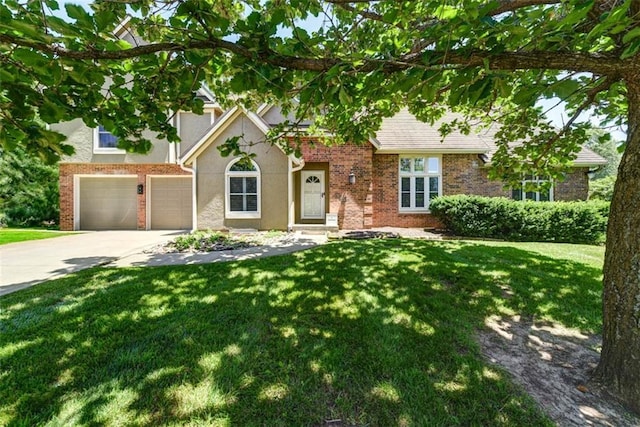 3147 N 131st St, Kansas City, KS 66109 - view of front of house featuring driveway, a front lawn, and an attached garage