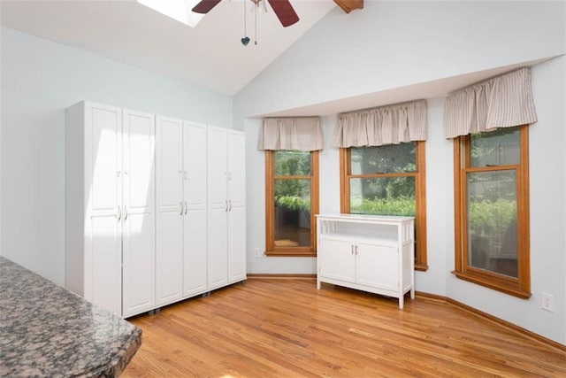3147 N 131st St, Kansas City, KS 66109 - bedroom featuring light wood-style floors, high vaulted ceiling, beamed ceiling, and ceiling fan