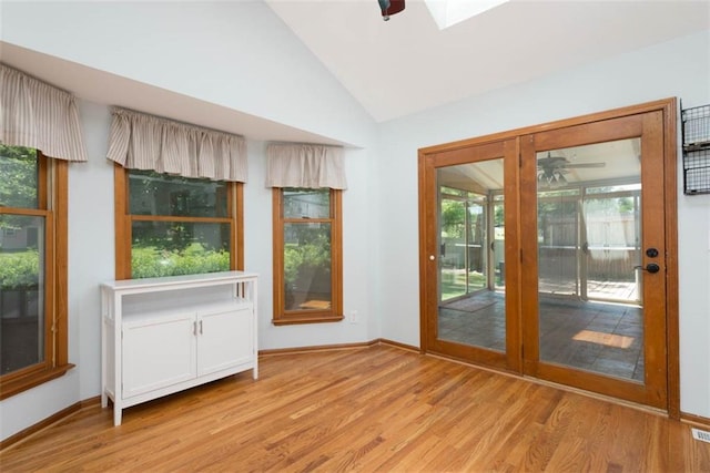 3147 N 131st St, Kansas City, KS 66109 - entryway featuring ceiling fan, lofted ceiling, wood finished floors, and a skylight