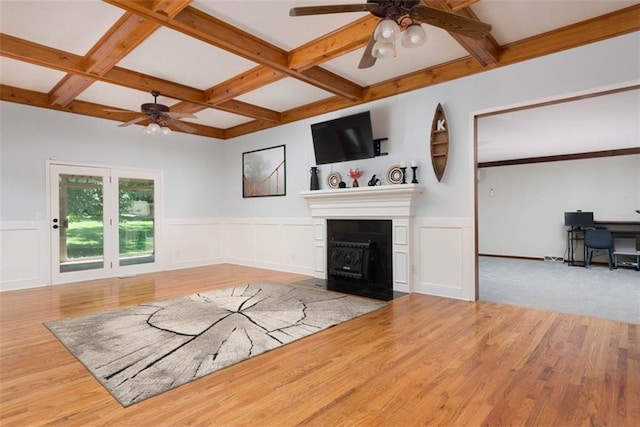 3147 N 131st St, Kansas City, KS 66109 - unfurnished living room featuring ceiling fan, coffered ceiling, wood finished floors, beam ceiling, and a fireplace with flush hearth