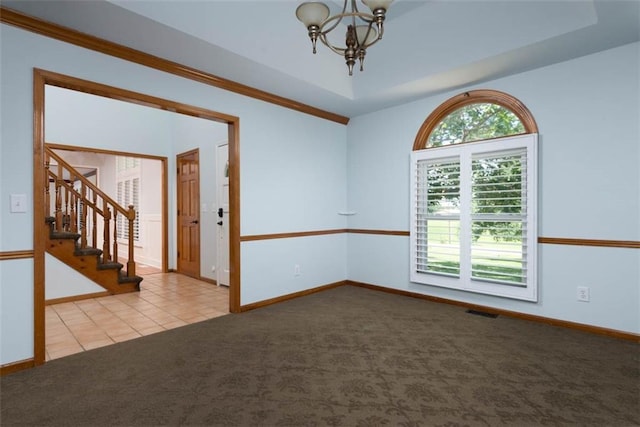 3147 N 131st St, Kansas City, KS 66109 - carpeted empty room featuring a chandelier, stairs, and tile patterned flooring