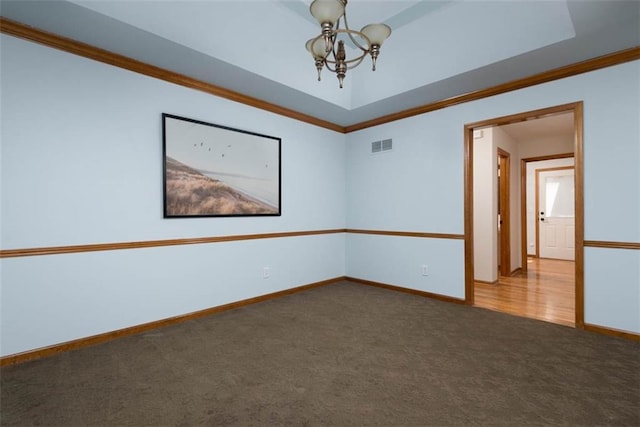 3147 N 131st St, Kansas City, KS 66109 - carpeted spare room featuring a chandelier and crown molding
