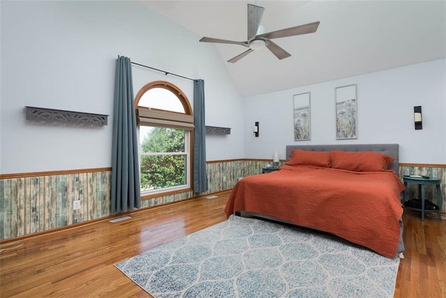 3147 N 131st St, Kansas City, KS 66109 - bedroom with high vaulted ceiling, wood finished floors, and a ceiling fan