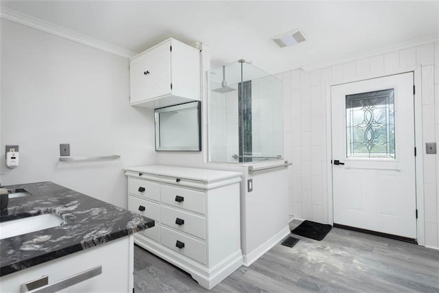 3147 N 131st St, Kansas City, KS 66109 - full bathroom with ornamental molding, walk in shower, wood finished floors, and vanity