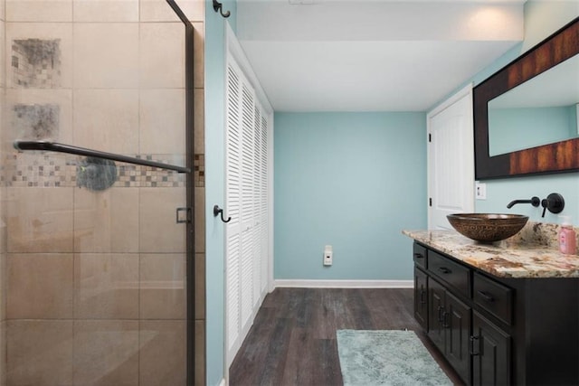 3147 N 131st St, Kansas City, KS 66109 - full bathroom featuring vanity, wood finished floors, and a stall shower