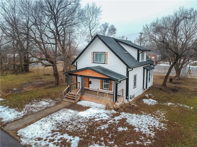 1811 Kimball Ave, Kansas City, KS 66104 - view of front of property featuring covered porch and roof with shingles