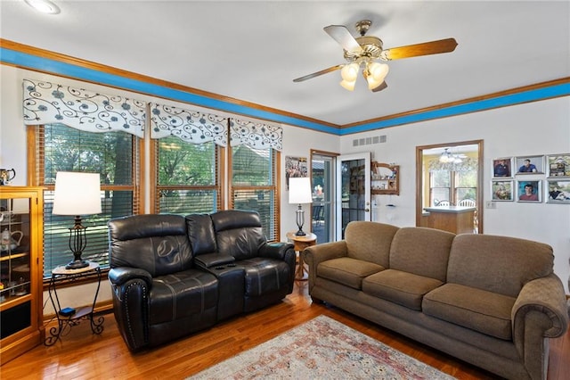 11808 W 128th St, Overland Park, KS 66213 - living room featuring ceiling fan, wood finished floors, and plenty of natural light