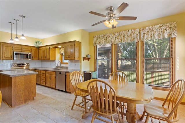 11808 W 128th St, Overland Park, KS 66213 - dining area with plenty of natural light, ceiling fan, and light tile patterned floors