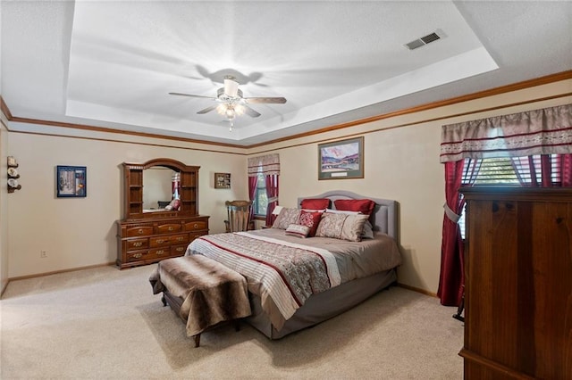11808 W 128th St, Overland Park, KS 66213 - bedroom with a tray ceiling, carpet floors, crown molding, and a ceiling fan