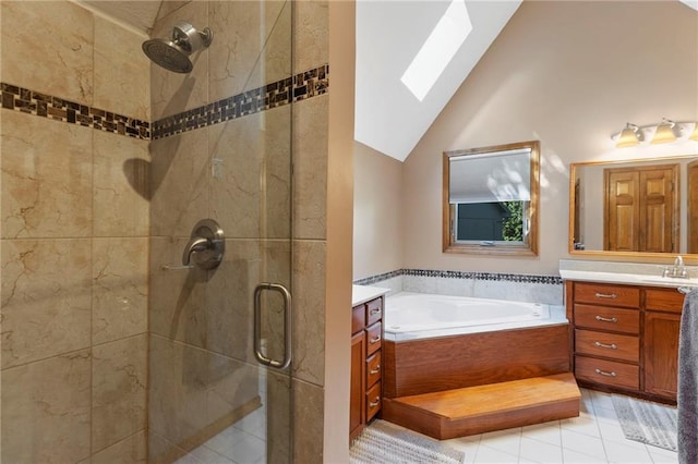 11808 W 128th St, Overland Park, KS 66213 - full bathroom featuring a skylight, vanity, a stall shower, lofted ceiling, and a bath