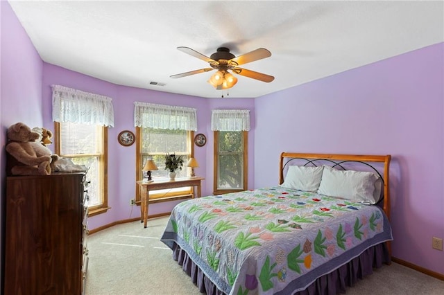 11808 W 128th St, Overland Park, KS 66213 - carpeted bedroom with baseboards and a ceiling fan