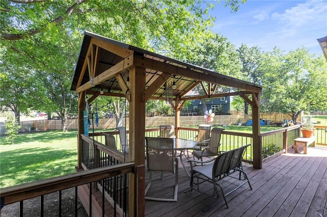 11808 W 128th St, Overland Park, KS 66213 - wooden deck featuring a fenced backyard, outdoor dining area, and a gazebo